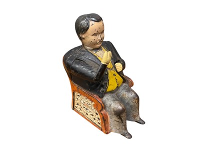 Lot 2562 - Late 19th century American cast iron Tammany mechanical money bank, in the form of a well dressed seated gentleman, based upon the notoriously corrupt New York politician Boss Tweed, marked Hall’s...