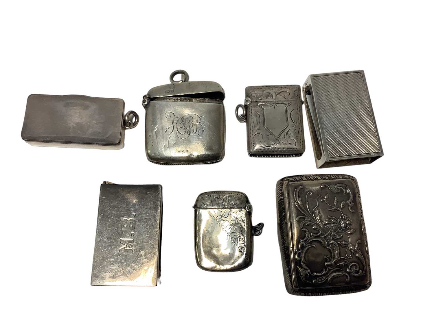 Lot 76 - Five Edwardian and later silver Vesta cases and two silver match box holders ( 7)