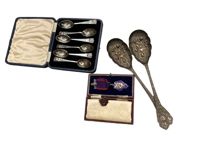 Lot 2515 - Cased set of silver teaspoons, pair of berry spoons, medals