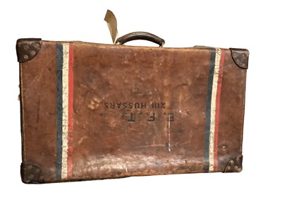 Lot 2130 - Vintage brown leather suitcase 'E.F.T. XIII HUSSARS' with remains of luggage labels New Zealand Shipping Co.