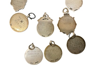 Lot 575 - Collection of 1920s silver football medals