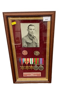 Lot 817 - Second World War medal group comprising 1939 - 1945 Star, Africa Star with 1st Army clasp, Italy Star, Defence and War medals, mounted in a glazed frame