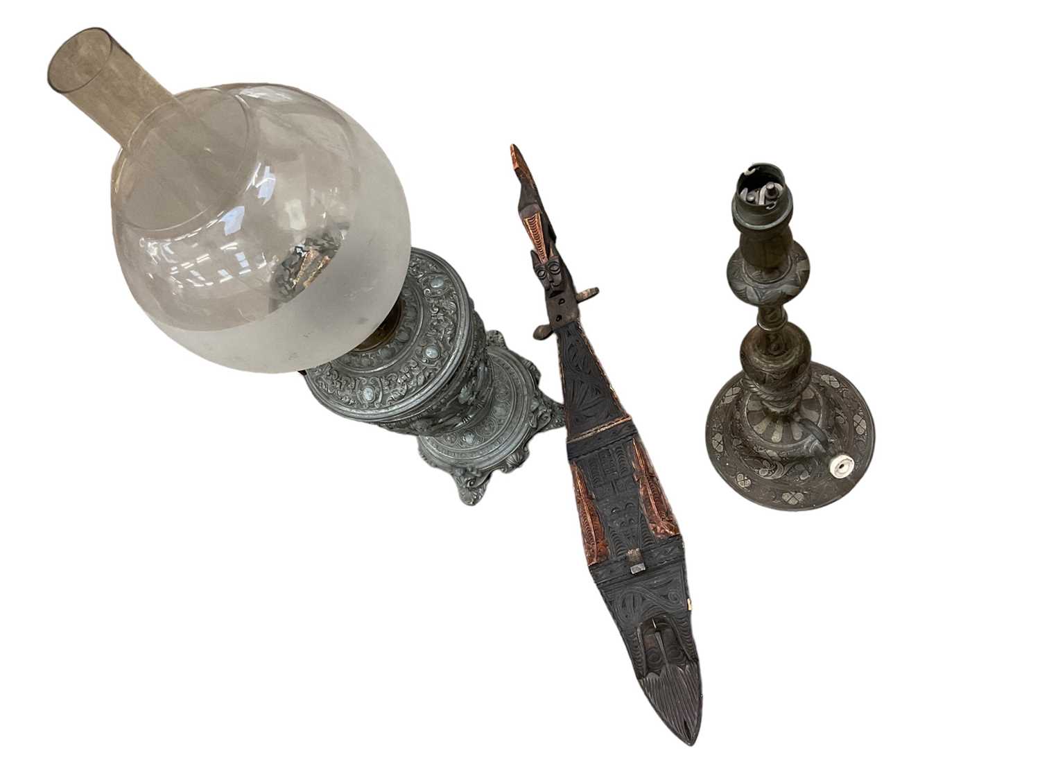 Lot 2517 - Antique Hookah base converted to a lamp, together with decorative oil lamp and an African carved wooden musical instrument