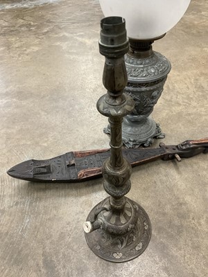 Lot 2517 - Antique Hookah base converted to a lamp, together with decorative oil lamp and an African carved wooden musical instrument