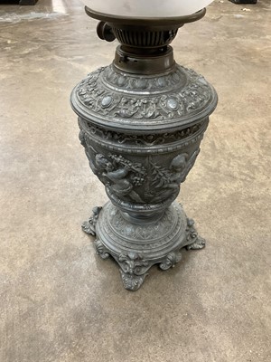 Lot 2517 - Antique Hookah base converted to a lamp, together with decorative oil lamp and an African carved wooden musical instrument