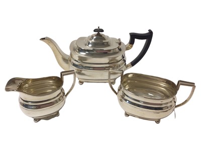 Lot 284 - 1930s George III style silver three piece tea set