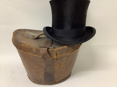 Lot 2133 - Black silk top hat Extra Quality West End Style in a leather hat box.