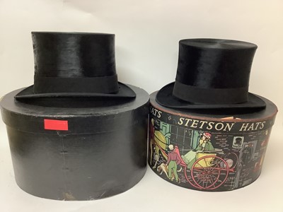 Lot 2134 - Black silk top hat Thos. Townend & Co. in a pictorial Stetson Hats box. One other black silk top hat Dunn & Co Strand London in hat box.