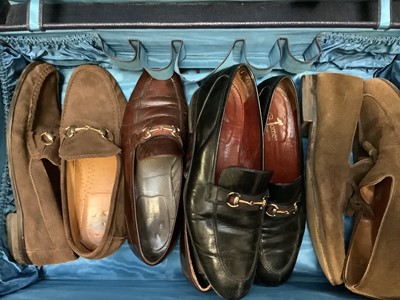 Lot 2137 - A leather case of men's vintage accessories including shoes with horse bit trim, three straw hats and one felt hat, waistcoats, silk ties, leather briefcase.