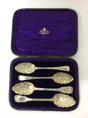 Lot 203 - Two pairs of silver berry spoons