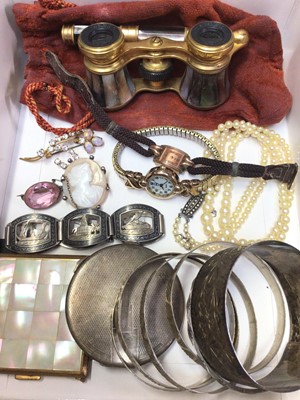Lot 97 - Silver powder compact, silver mounted cameo brooch, various white metal bangles, wristwatches, Iris Paris mother of pearl and brass opera glasses and other bijouterie