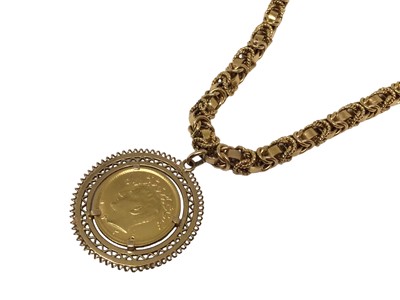 Lot 100 - Iranian gold coin in pendant mount on yellow metal fancy link chain, 49.5cm long