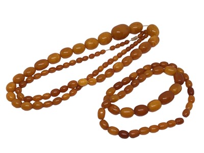 Lot 104 - Two 1930s amber bead necklaces (possibly reconstituted)