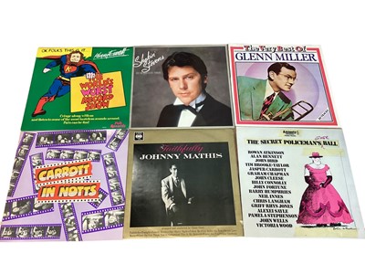 Lot 2256 - Two boxes of mixed vinyl records including Videodiscs, LPs, 12 inch and 7 inch singles - artists include John Lennon, Clifford T. Ward, Sad Cafe, Mike Oldfield, Nina, Hollies & Moody Blues - condit...