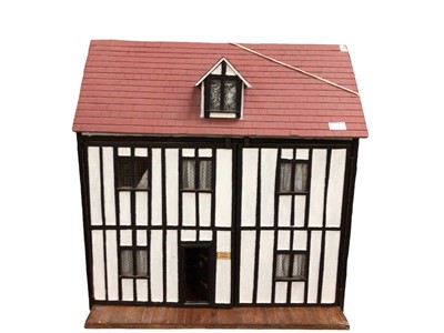 Lot 2036 - Dolls house two storey, wooden construction with large selection of furniture and accessories