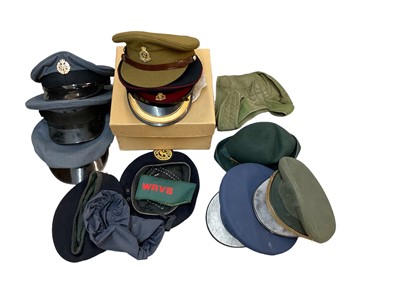 Lot 755 - Two Elizabeth II Royal Army Medical Corps Officers Caps, together with various other military hats and caps (1 box)