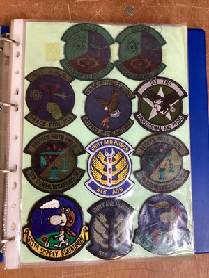 Lot 762 - Three albums of American Air Force military cloth badges to include rank insignia (3 albums)