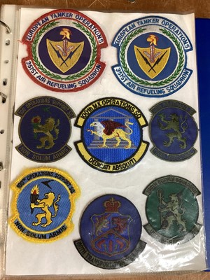 Lot 762 - Three albums of American Air Force military cloth badges to include rank insignia (3 albums)