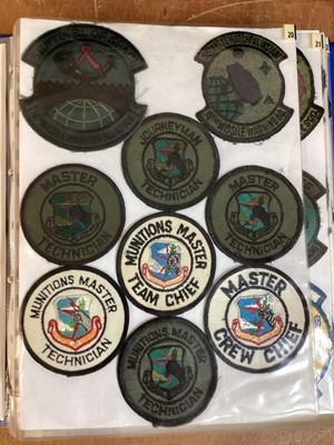 Lot 762 - Three albums of American Air Force military cloth badges to include rank insignia (3 albums)