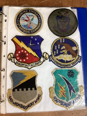 Lot 762 - Three albums of American Air Force military cloth badges to include rank insignia (3 albums)