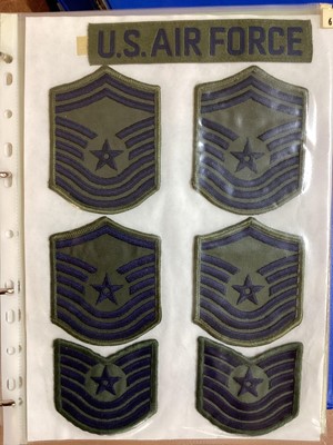 Lot 762 - Three albums of American Air Force military cloth badges to include rank insignia (3 albums)