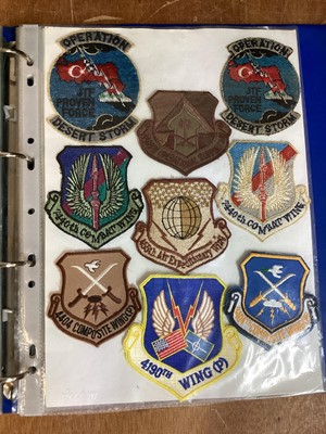 Lot 762 - Three albums of American Air Force military cloth badges to include rank insignia (3 albums)