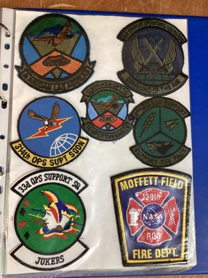 Lot 762 - Three albums of American Air Force military cloth badges to include rank insignia (3 albums)