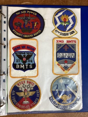 Lot 762 - Three albums of American Air Force military cloth badges to include rank insignia (3 albums)