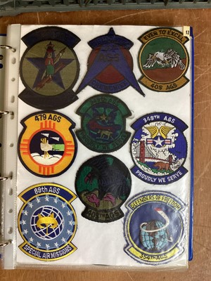 Lot 764 - Three albums of American Air Force military cloth badges to include rank insignia (3 albums)