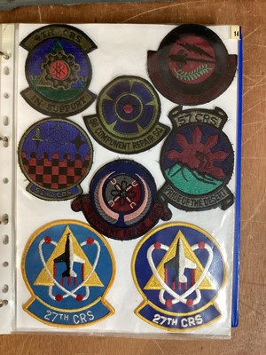 Lot 764 - Three albums of American Air Force military cloth badges to include rank insignia (3 albums)