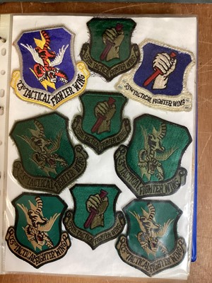 Lot 764 - Three albums of American Air Force military cloth badges to include rank insignia (3 albums)