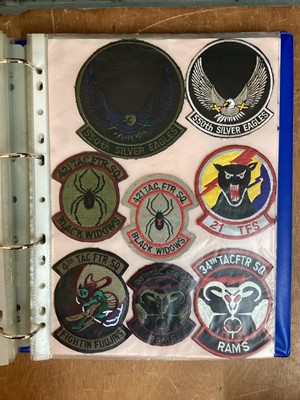 Lot 764 - Three albums of American Air Force military cloth badges to include rank insignia (3 albums)