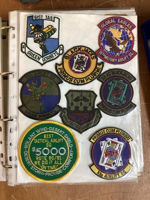 Lot 765 - Three albums of American Air Force military cloth badges to include rank insignia (3 albums)