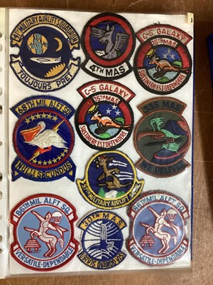 Lot 765 - Three albums of American Air Force military cloth badges to include rank insignia (3 albums)