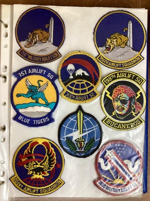 Lot 765 - Three albums of American Air Force military cloth badges to include rank insignia (3 albums)