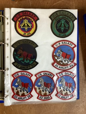 Lot 765 - Three albums of American Air Force military cloth badges to include rank insignia (3 albums)