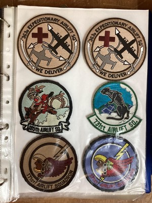 Lot 765 - Three albums of American Air Force military cloth badges to include rank insignia (3 albums)