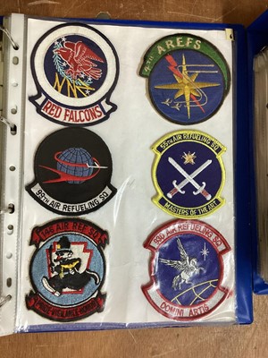 Lot 765 - Three albums of American Air Force military cloth badges to include rank insignia (3 albums)