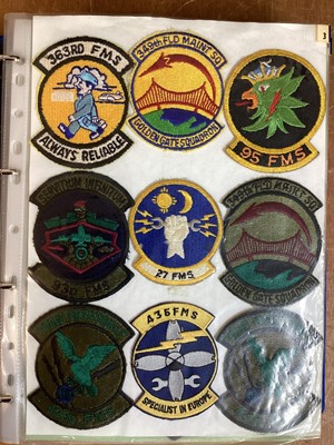 Lot 765 - Three albums of American Air Force military cloth badges to include rank insignia (3 albums)