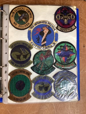 Lot 765 - Three albums of American Air Force military cloth badges to include rank insignia (3 albums)