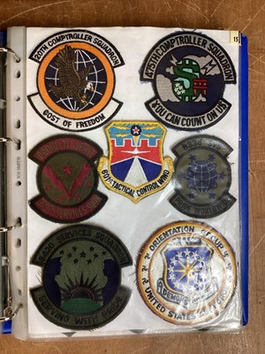 Lot 765 - Three albums of American Air Force military cloth badges to include rank insignia (3 albums)