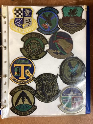 Lot 765 - Three albums of American Air Force military cloth badges to include rank insignia (3 albums)