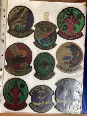 Lot 765 - Three albums of American Air Force military cloth badges to include rank insignia (3 albums)