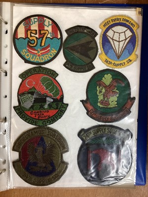 Lot 765 - Three albums of American Air Force military cloth badges to include rank insignia (3 albums)