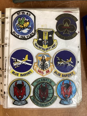Lot 765 - Three albums of American Air Force military cloth badges to include rank insignia (3 albums)