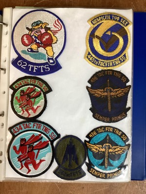 Lot 766 - Four albums of American Air Force military cloth badges to include rank insignia (4 albums)