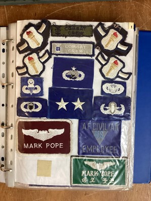 Lot 766 - Four albums of American Air Force military cloth badges to include rank insignia (4 albums)