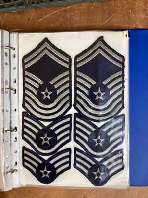 Lot 766 - Four albums of American Air Force military cloth badges to include rank insignia (4 albums)