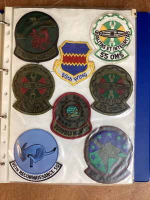 Lot 766 - Four albums of American Air Force military cloth badges to include rank insignia (4 albums)