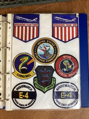 Lot 766 - Four albums of American Air Force military cloth badges to include rank insignia (4 albums)